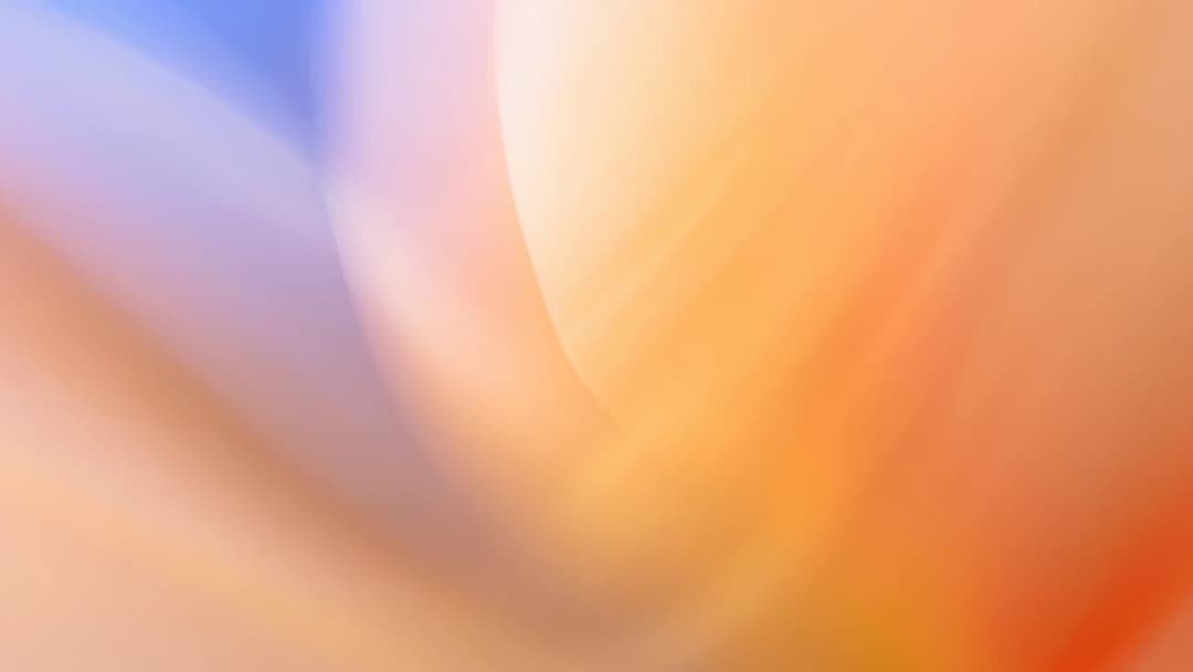 A developer refactoring code on a dual-monitor setup